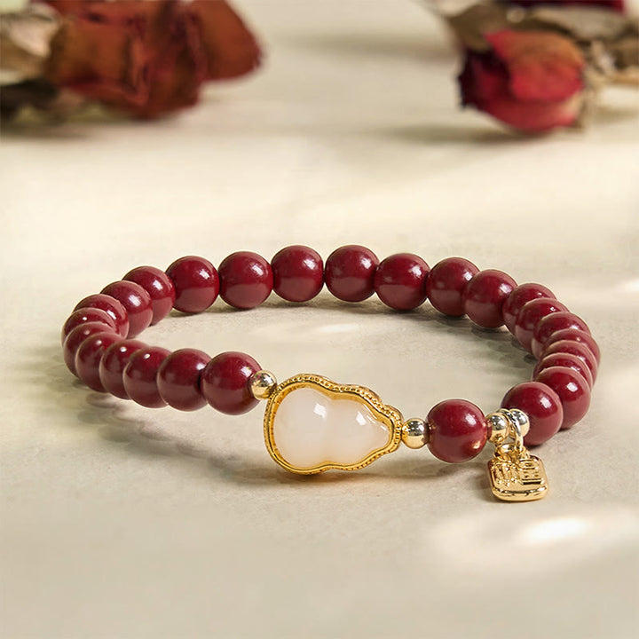 Braccialetto di benedizione con ciondolo Fu, carattere zucca e cinabro Buddha Stones