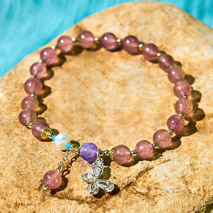 Braccialetto con ciondolo a farfalla in quarzo fragola verde con Buddha Stones e quarzo fragola naturale