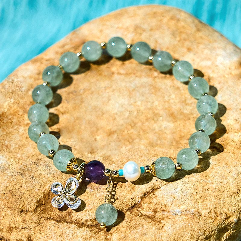 Braccialetto con ciondolo a farfalla in quarzo fragola verde con Buddha Stones e quarzo fragola naturale
