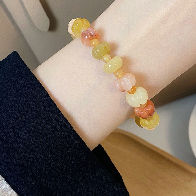 Braccialetto di fortuna e ricchezza con perle di zucca in giada di seta dorata e Buddha Stones