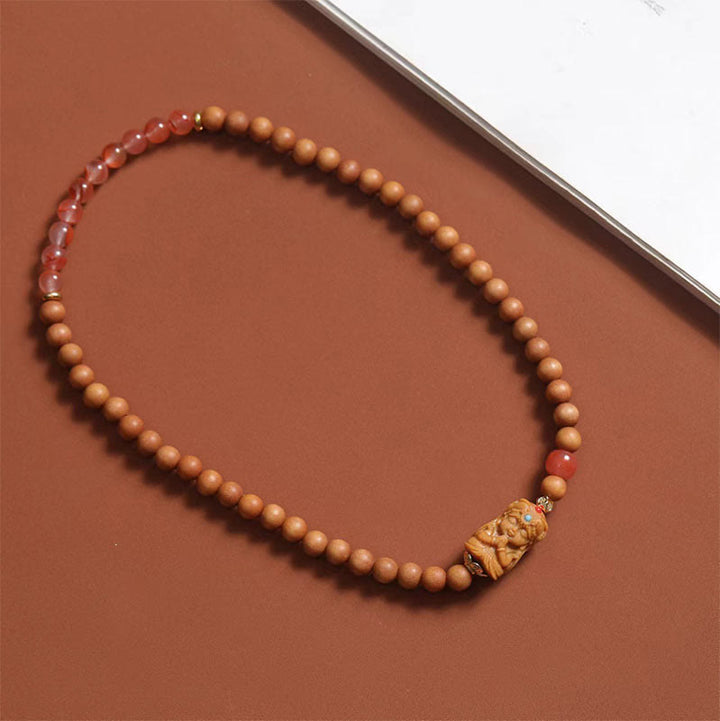 Bracciale della fortuna in agata rossa del sud, sandalo e Buddha Stones tibetane Zakiram, dea della ricchezza - image 2