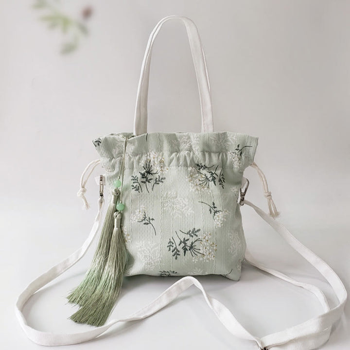 Borsa a tracolla in tela con fiori bianchi e foglie verdi, motivo Buddha Stones