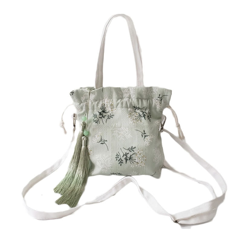 Borsa a tracolla in tela con fiori bianchi e foglie verdi, motivo Buddha Stones