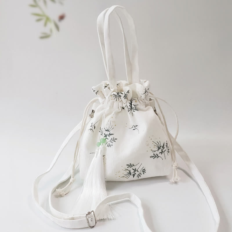 Borsa a tracolla in tela con fiori bianchi e foglie verdi, motivo Buddha Stones