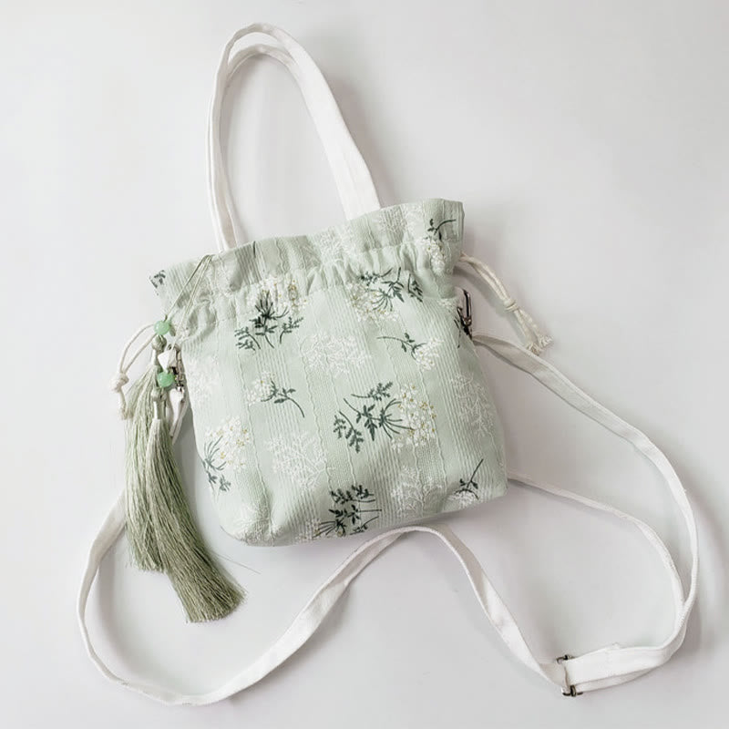 Borsa a tracolla in tela con fiori bianchi e foglie verdi, motivo Buddha Stones