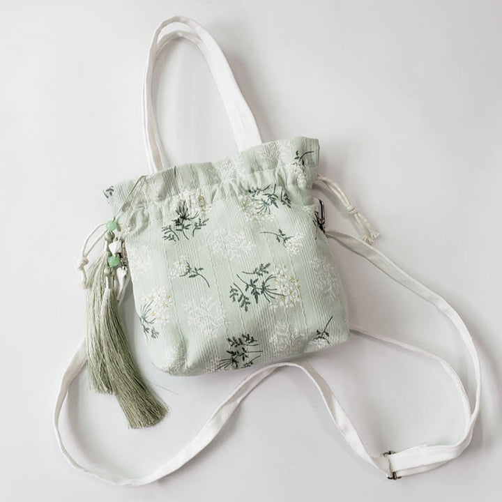 Borsa a tracolla in tela con fiori bianchi e foglie verdi, motivo Buddha Stones