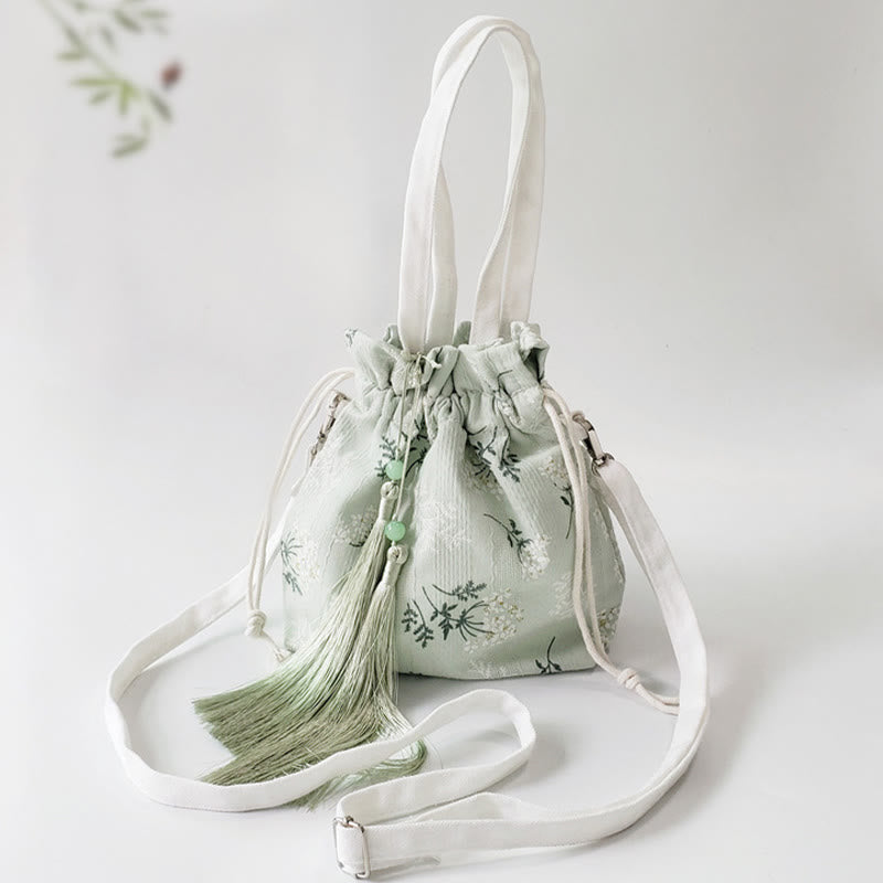 Borsa a tracolla in tela con fiori bianchi e foglie verdi, motivo Buddha Stones