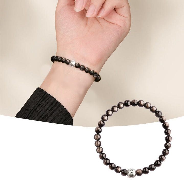 Bracciale di protezione Om Mani Padme Hum in ossidiana naturale lucida e argento Buddha Stones