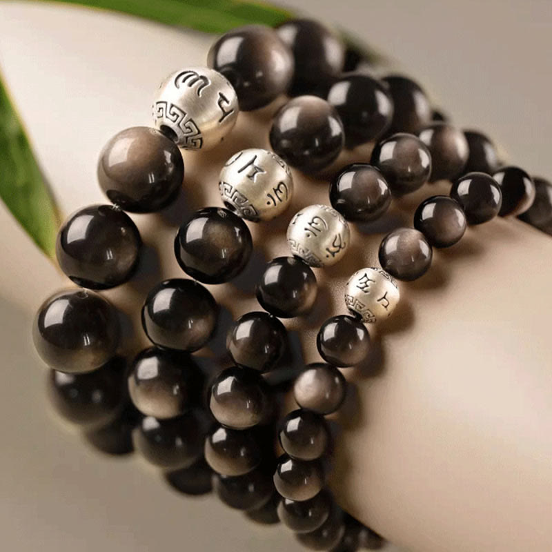 Bracciale di protezione Om Mani Padme Hum in ossidiana naturale lucida e argento Buddha Stones