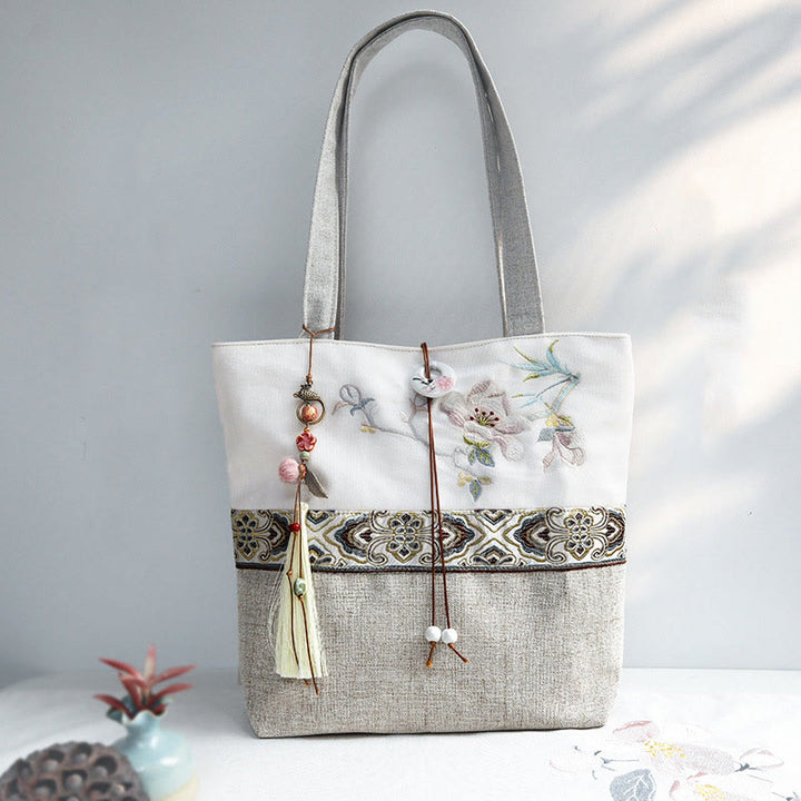 Borsa a tracolla in tela di poliestere con ricamo Buddha Stones Magnolia