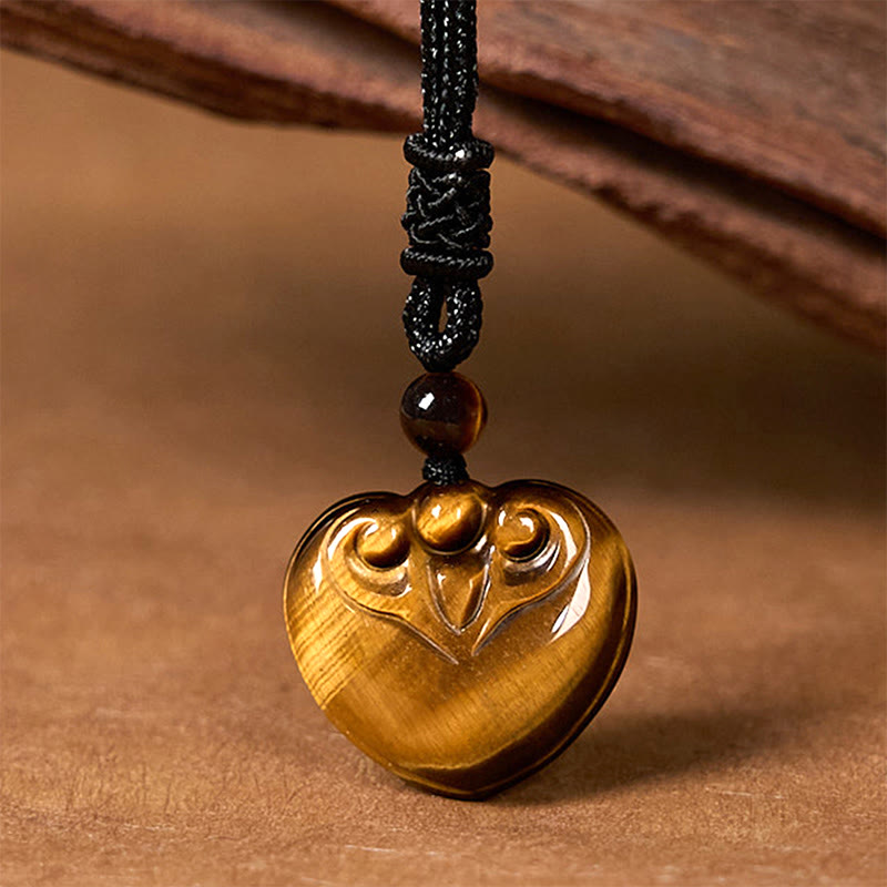 Collana con ciondolo in corda di protezione con motivo a cuore con occhio di tigre naturale Buddha Stones