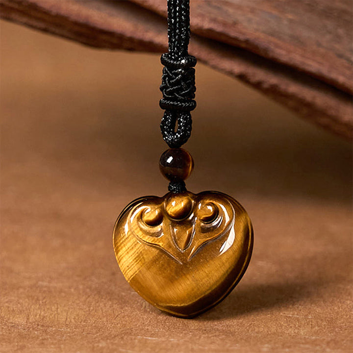 Collana con ciondolo in corda di protezione con motivo a cuore con occhio di tigre naturale Buddha Stones