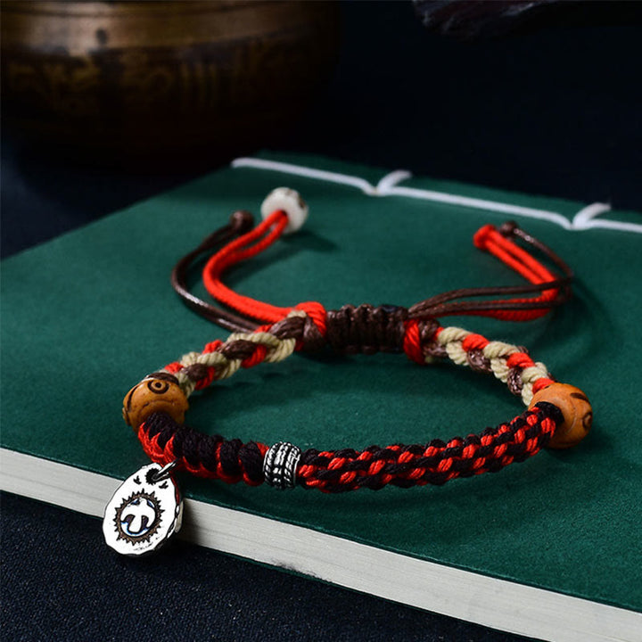Braccialetto portafortuna in corda Garuda intrecciata a mano con Buddha Stones tibetane