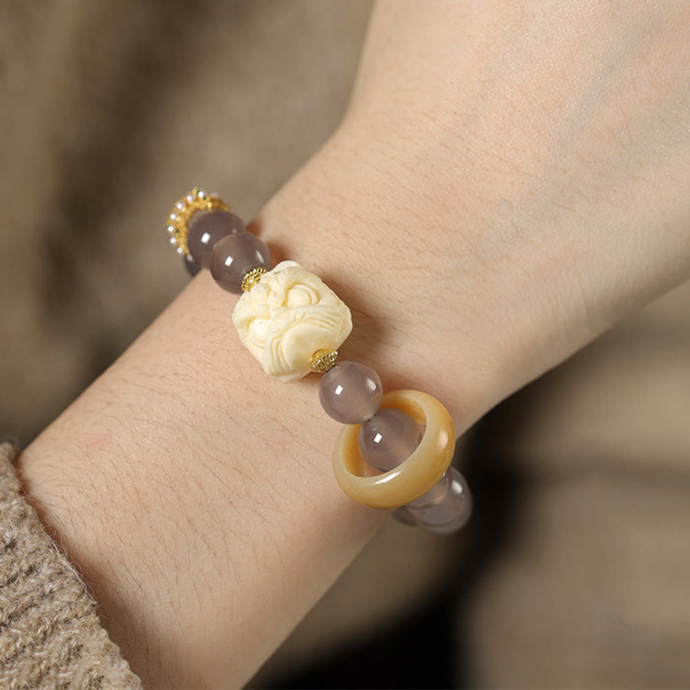 Bracciale Buddha Stones Ambra Grigio Agata Avorio Frutta Confidenza