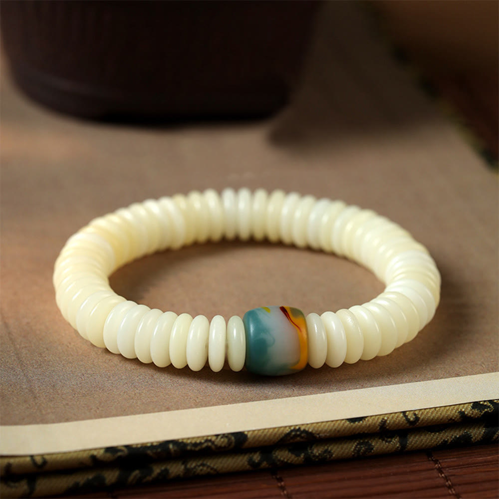 Braccialetto con nappa e semi di Bodhi bianchi naturali, pietra della saggezza Buddha Stones. - Braccialetto (circonferenza del polso 14-15 cm) - image 0