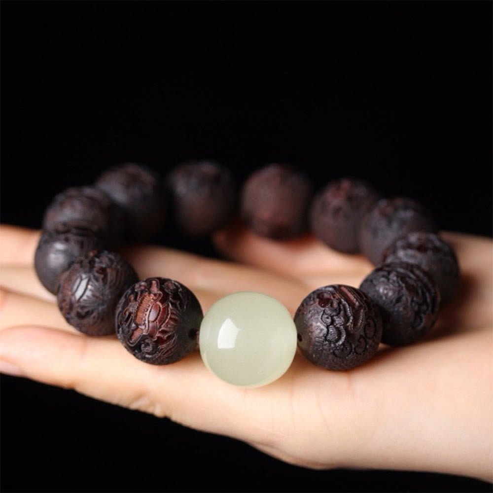 Braccialetto PiXiu Warmth con incisione in palissandro tibetano Buddha Stones - image 1