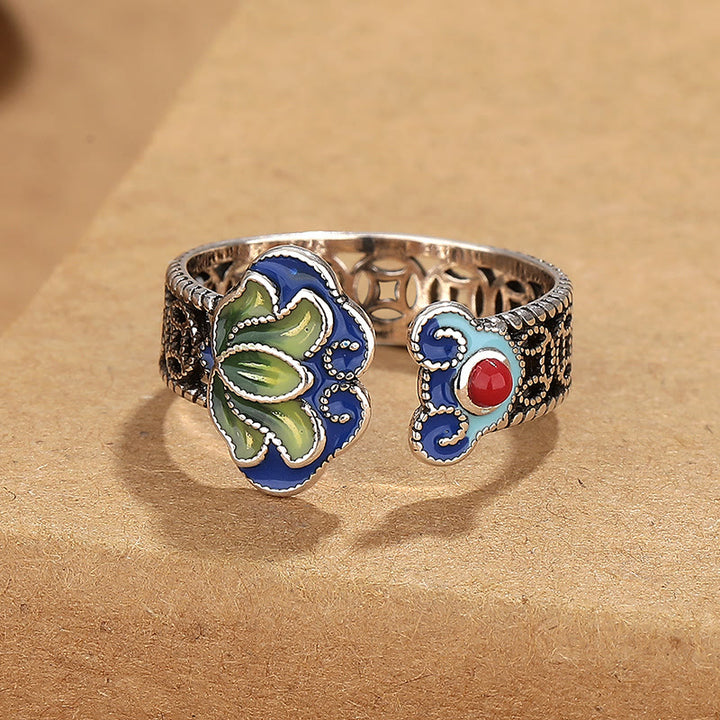 Anello regolabile con motivo a ciondoli Buddha Stones di loto, monete di rame e manico Ruyi.