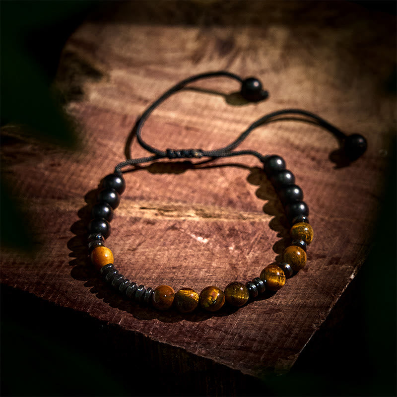 Set di 3 bracciali protettivi in ​​pietra lavica con occhio di tigre Buddha Stones - image 8