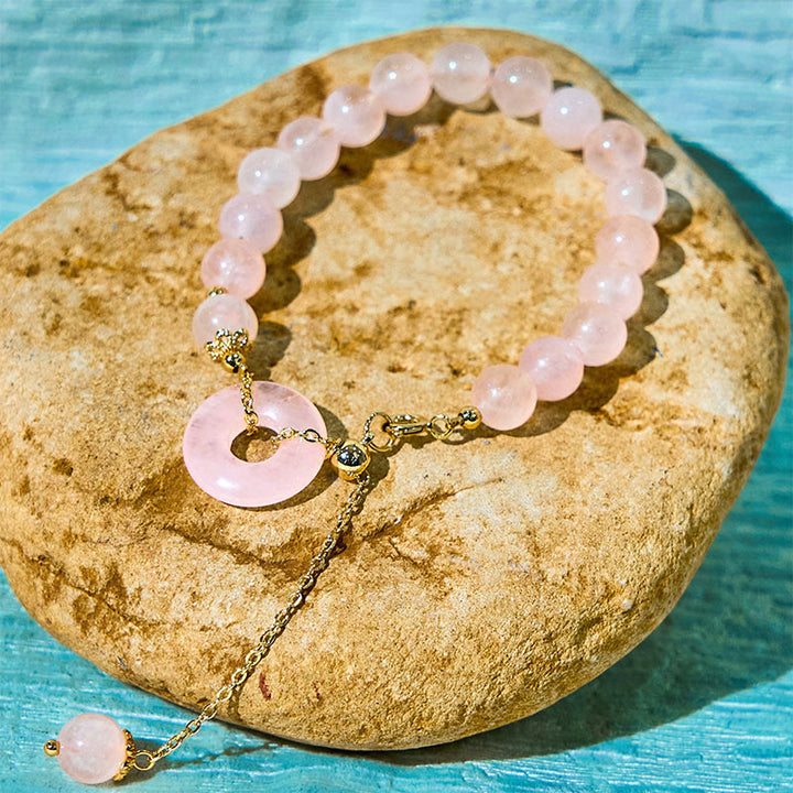 Braccialetto di autoaccettazione con fibbia della pace e perline di cristallo rosa naturale Buddha Stones - image 4