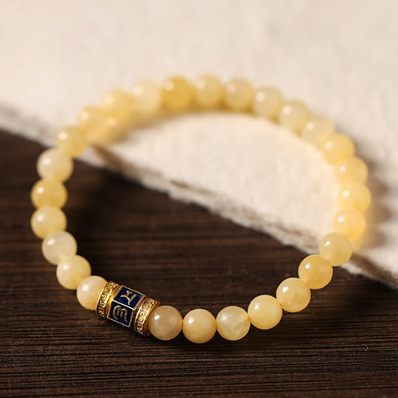 Bracciale della fortuna Buddha Stones e perle di topazio Om Mani Padme Hum