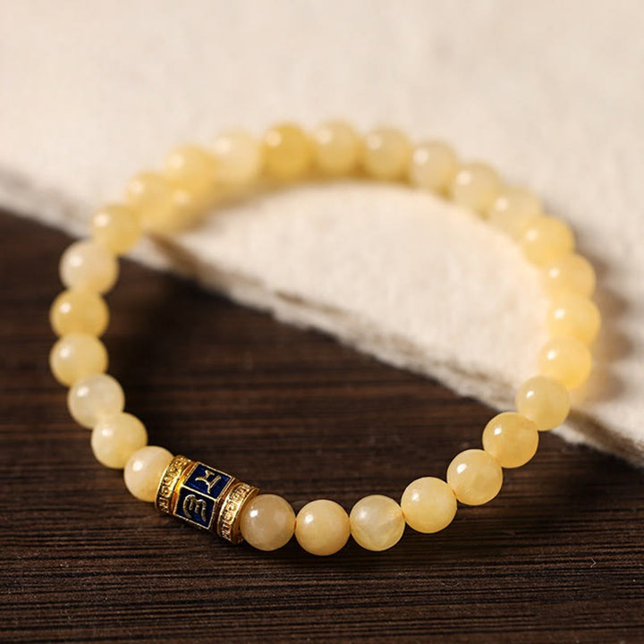 Bracciale della fortuna Buddha Stones e perle di topazio Om Mani Padme Hum