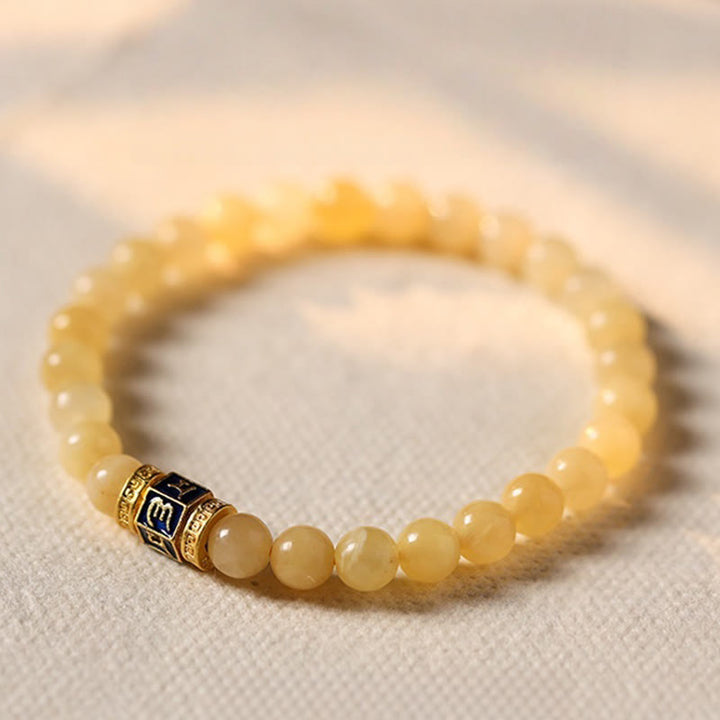Bracciale della fortuna Buddha Stones e perle di topazio Om Mani Padme Hum
