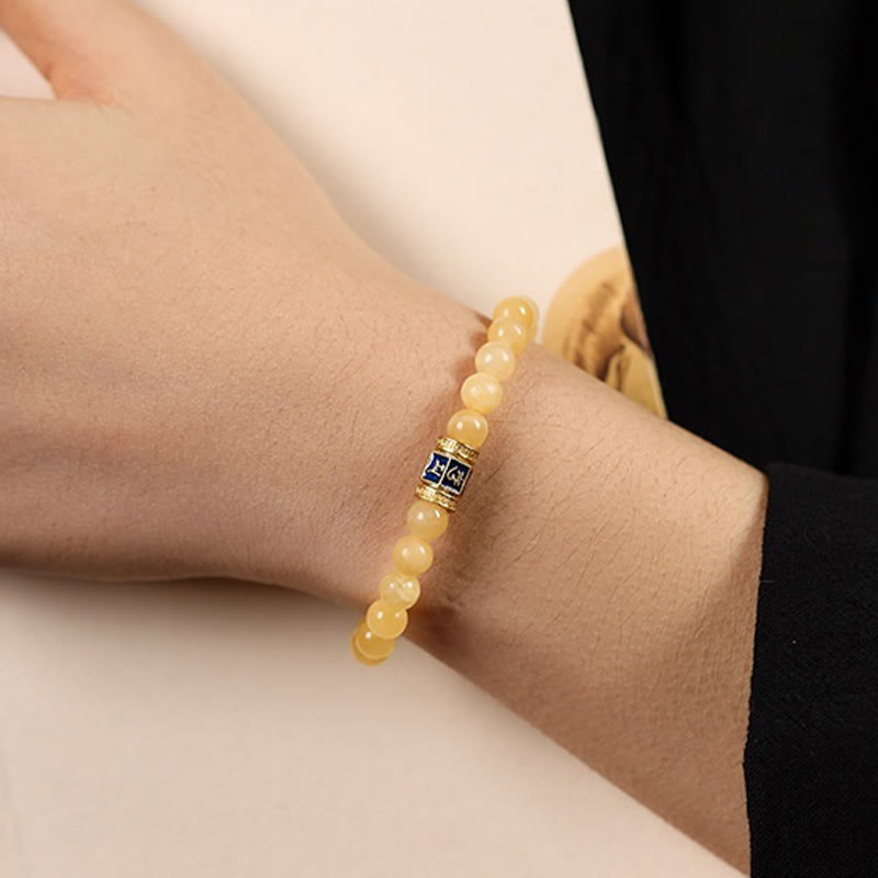 Bracciale della fortuna Buddha Stones e perle di topazio Om Mani Padme Hum