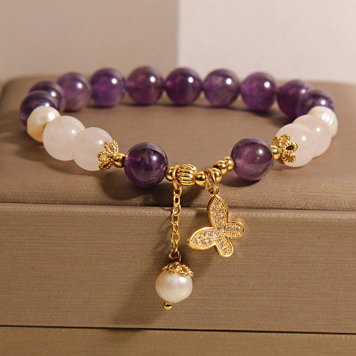 Bracciale con ciondolo a farfalla in cristallo di perla e ametista naturale Buddha Stones