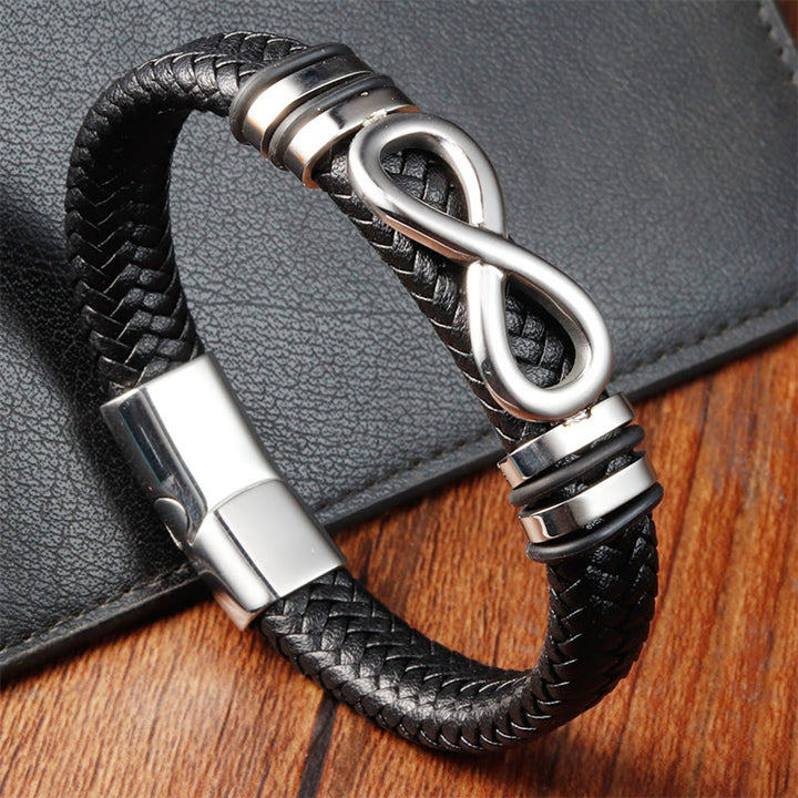 Bracciale con fibbia in pelle intrecciata rinforzata in acciaio al titanio con design a nodo infinito Buddha Stones