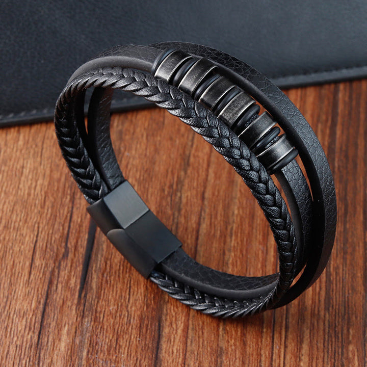 Bracciale Buddha Stones semplice in acciaio al titanio intrecciato con fibbia in pelle a tre strati e calmante