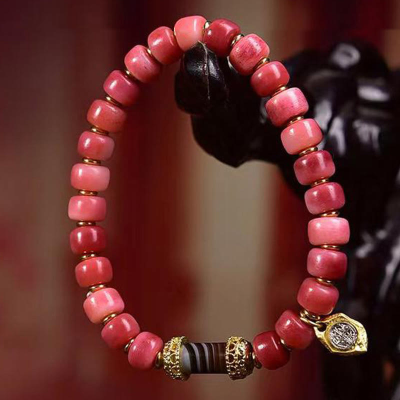 Braccialetto della fortuna in agata rossa e rame con osso di cammello tibetano Buddha Stones