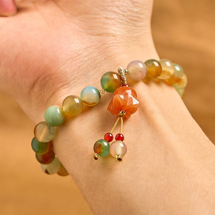 Braccialetto di supporto con fibbia della pace a farfalla, mughetto, agata pavone colorata naturale di Buddha Stones