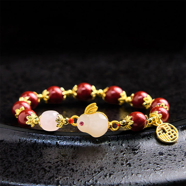 Braccialetto di benedizione con ciondolo a forma di coniglietto Fu, con Buddha Stones in cinabro