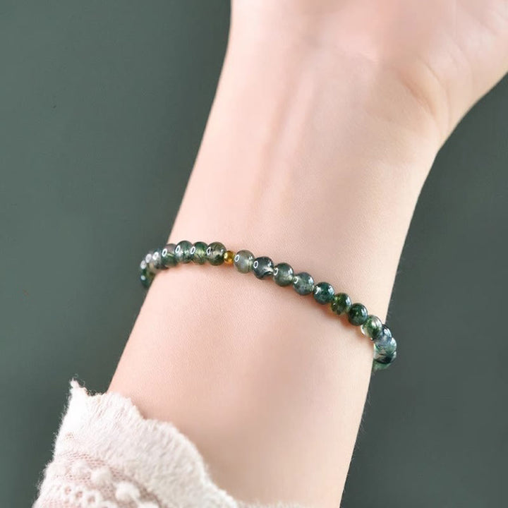 Braccialetto rilassante con perline portafortuna in agata muschiata e Buddha Stones