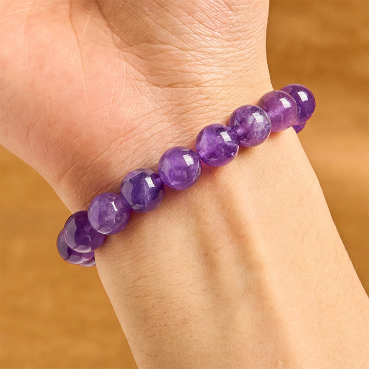 Bracciale spirituale con ciondolo a forma di fibbia della pace in ametista naturale Buddha Stones