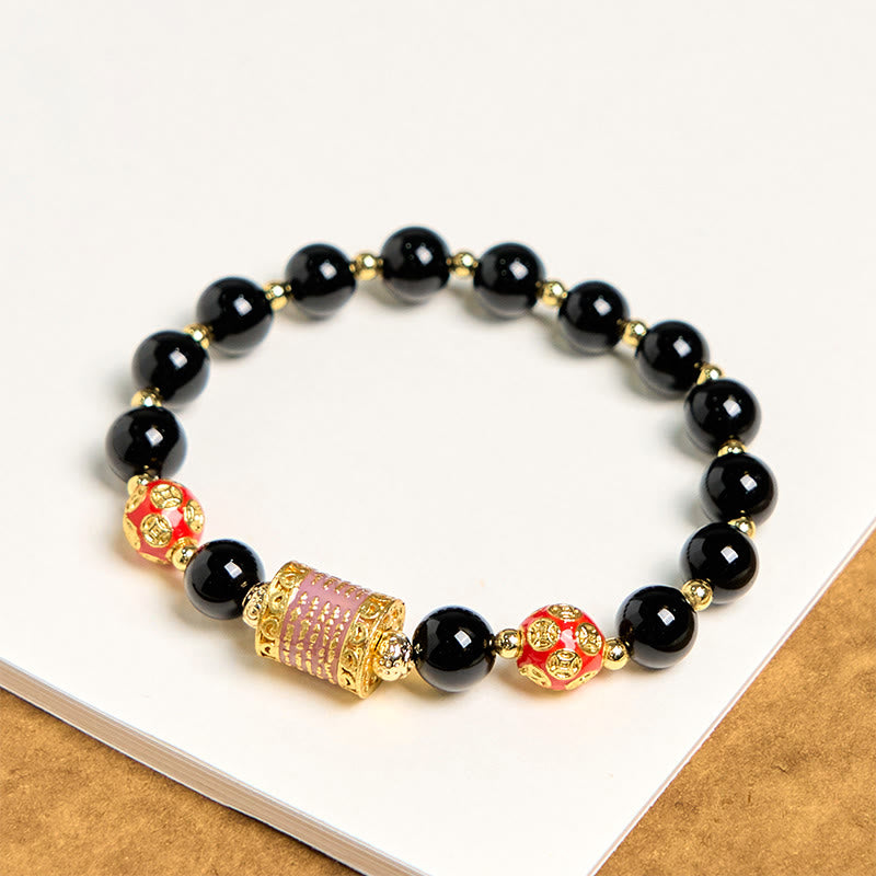 Bracciale della fortuna con cinque monete di rame e onice nero naturale di Buddha Stones