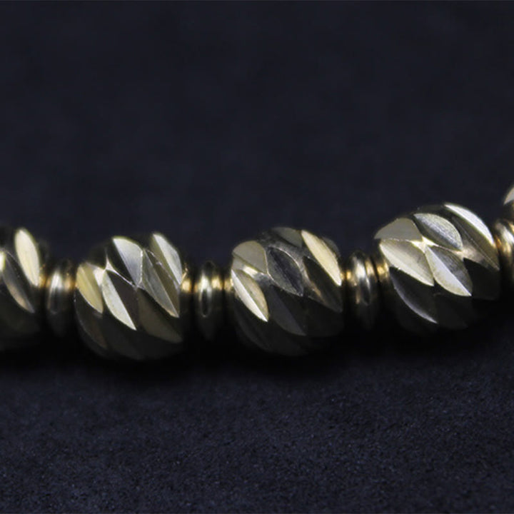 Braccialetto della ricchezza con perline di ottone e rame, motivo a coltello anticato , Buddha Stones