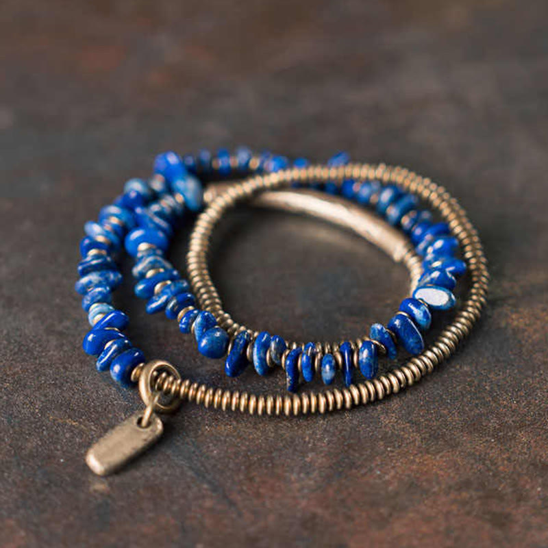 Bracciale Buddha Stones a forma irregolare con triplo giro di lazurite e lapislazzuli - 6,7-6,9 pollici (17-17,5 cm) - image 0