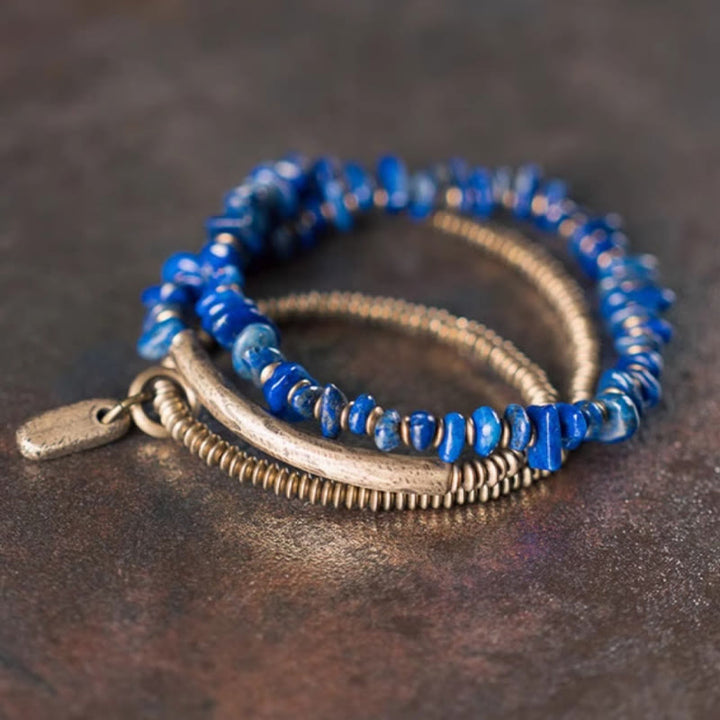 Bracciale Buddha Stones a forma irregolare con triplo giro di lazurite e lapislazzuli - image 1