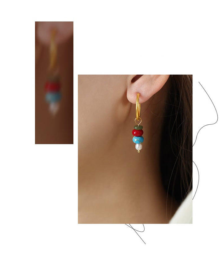 Orecchini in acciaio al titanio con perle di agata rossa naturale, design in pietra tibetana Marnyi di Buddha Stones