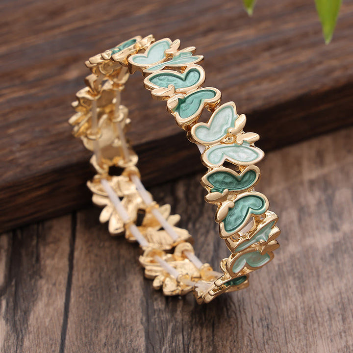 Bracciale elastico in lega con farfalla colorata Buddha Stones