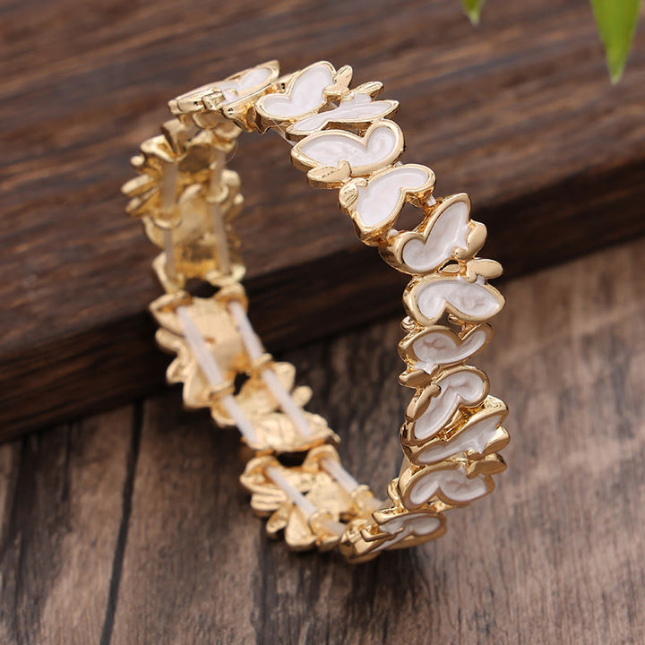 Bracciale elastico in lega con farfalla colorata Buddha Stones
