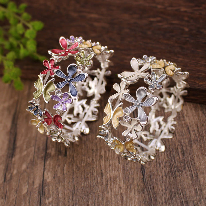 Bracciale elastico in lega con Buddha Stones, farfalle colorate e fiori