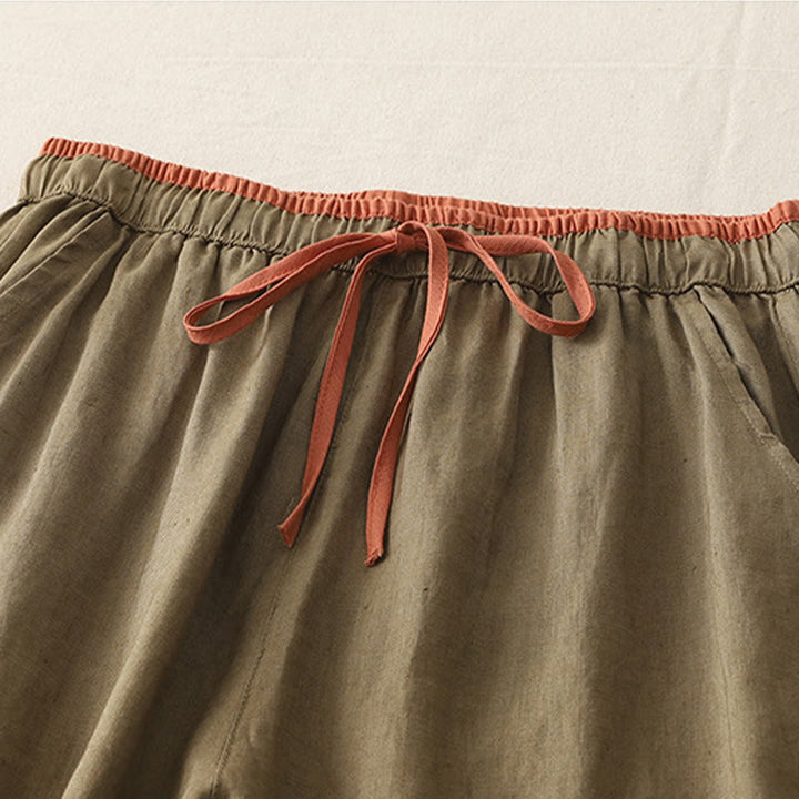 Pantaloni da donna a gamba larga con coulisse e tasche, modello casual color block con motivo Buddha Stones. - image 2