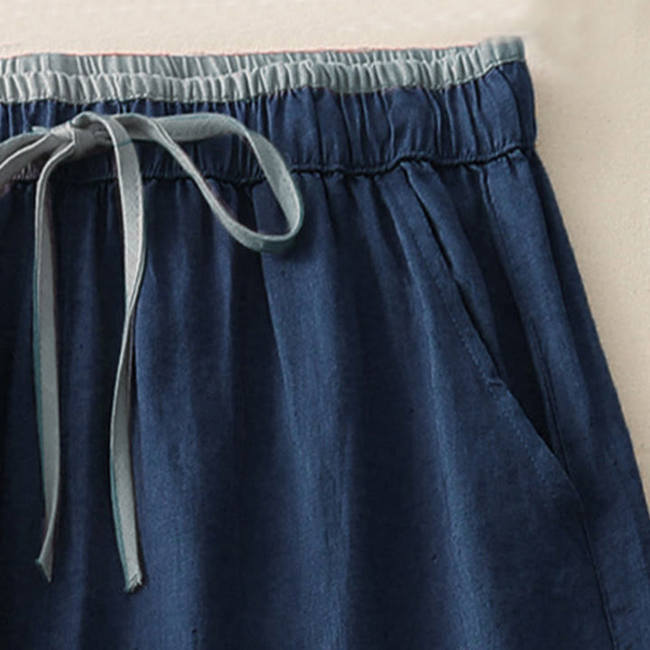 Pantaloni da donna a gamba larga con coulisse e tasche, modello casual color block con motivo Buddha Stones. - image 12