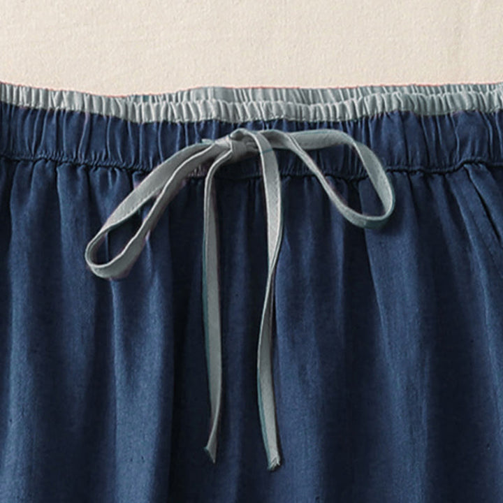 Pantaloni da donna a gamba larga con coulisse e tasche, modello casual color block con motivo Buddha Stones. - image 13