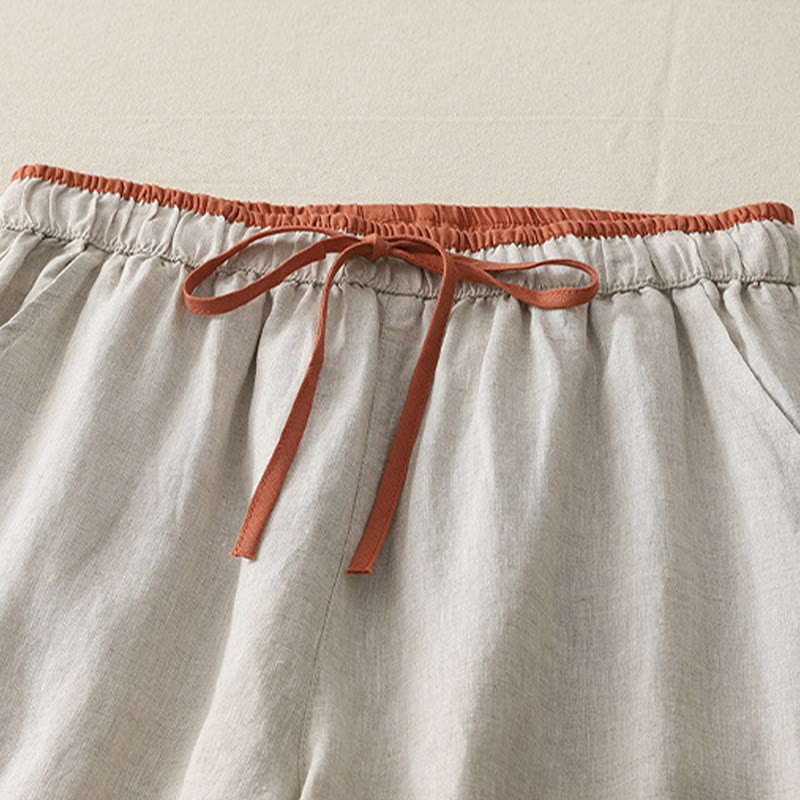 Pantaloni da donna a gamba larga con coulisse e tasche, modello casual color block con motivo Buddha Stones. - image 17