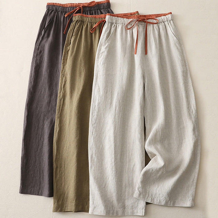 Pantaloni da donna a gamba larga con coulisse e tasche, modello casual color block con motivo Buddha Stones. - image 21