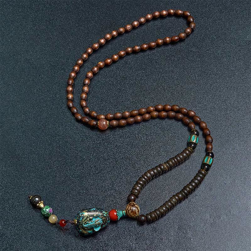 Collana con ciondolo a forma di testa di elefante, in legno wengé, fatto a mano in Tibet, con perline Dzi di protezione. - image 9