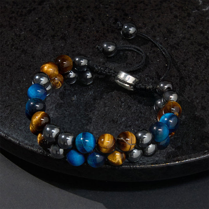 Braccialetto di forza con perline a doppia fila, motivo Om, in occhio di tigre blu naturale e magnetite nera con Buddha Stones